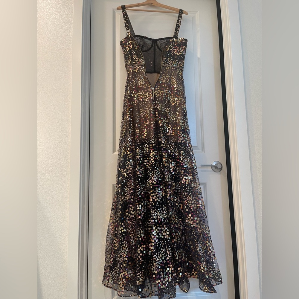 NWOT Bronx And Banco Midnight Noir Gown
Midnight Noir Gown Valentine - Picture 11 of 17
